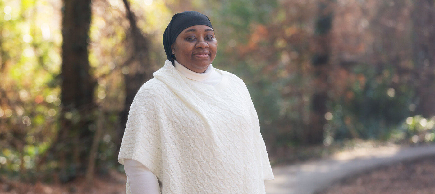 Michelle Ngom smiling outside