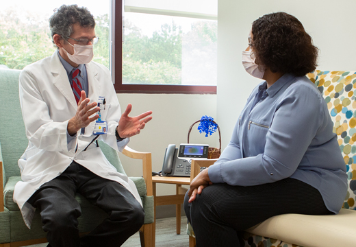 A provider meets with a patient