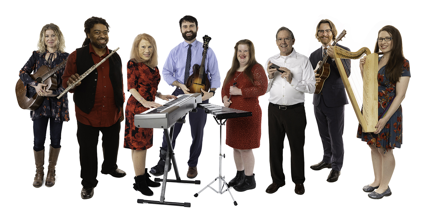 Musicians stand with instruments