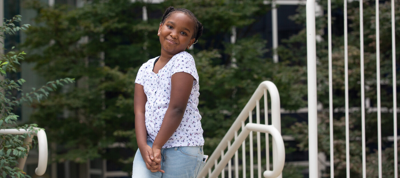 Abrielle smiles outside of Duke Children's Health Center