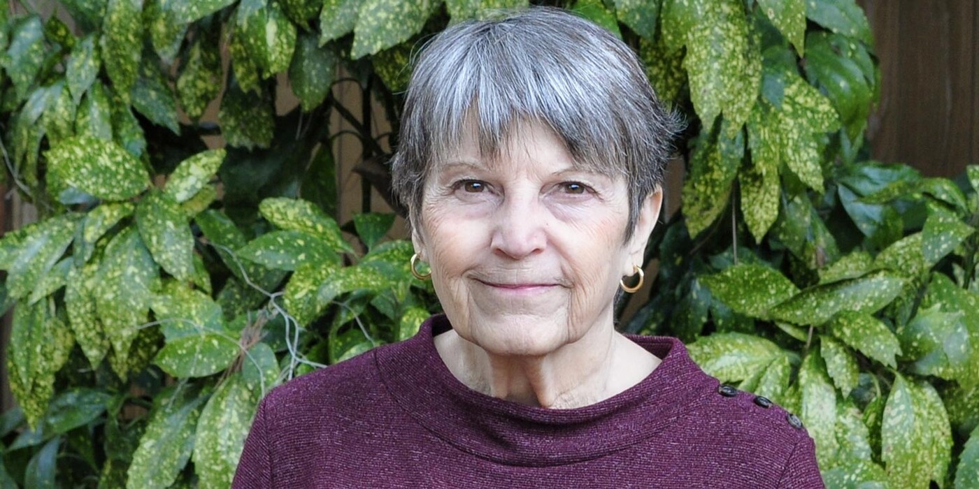 Lynne Barnett smiles outside