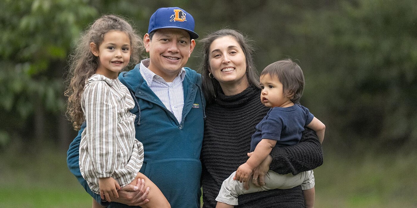 The Bellido family smiles for a photo outside