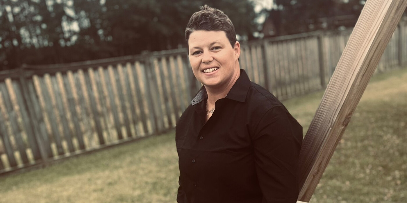 Chase Conklin, 34, smiles outside her home in South Mills, NC