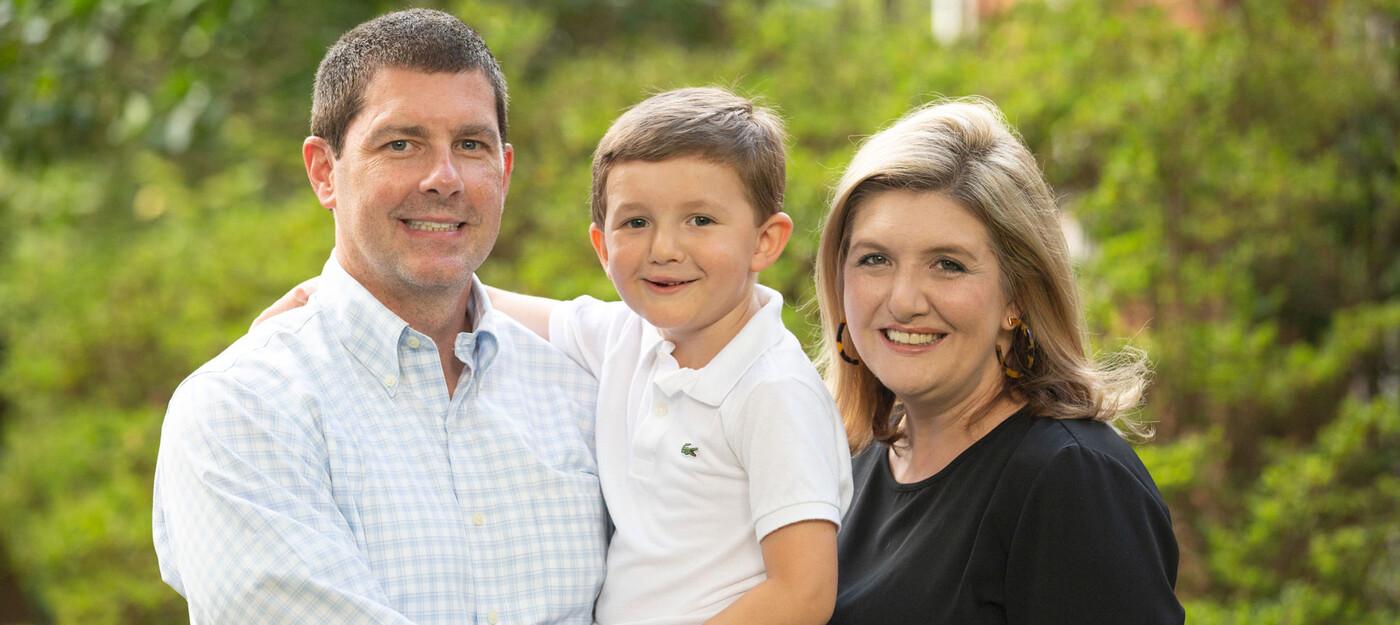 A family outside their home