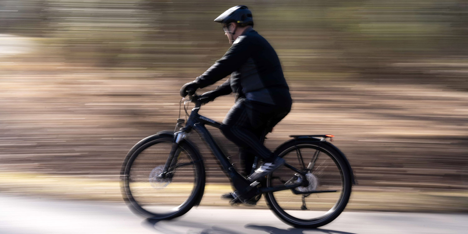 Mark bikes along a trail