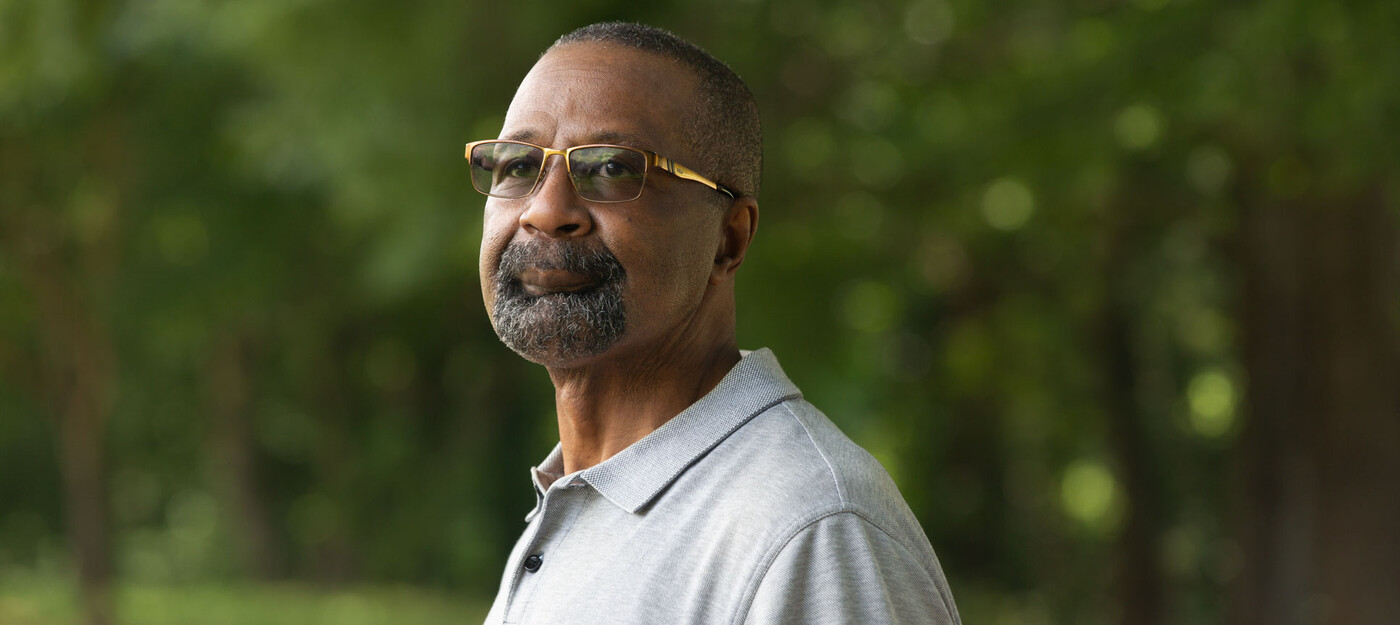 Roger Floyd stands outside