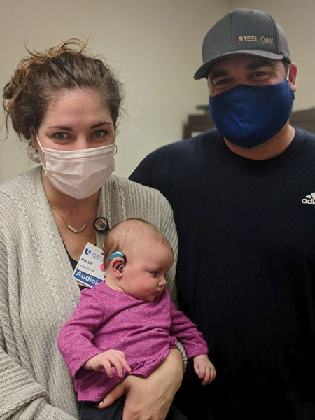 Holly and Jaison VanHorn at their daughter Nessa’s hearing aid fitting in December 2020.